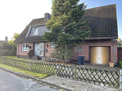 Straßenansicht - Einfamilienhaus mit 161,10 m² in Schortens / Roffhausen zum Kaufen