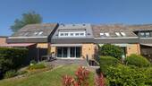 Blick aus dem Garten auf die Terrasse - 4 Zimmer Reihenmittelhaus in Schleswig
