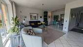 Wohn- Esszimmer mit Kachelofen - 
