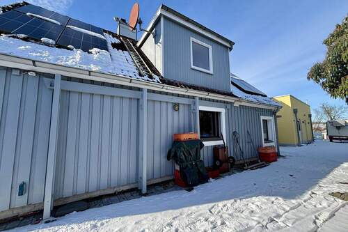 Seitliche Ansicht - Mehrfamilienhaus, Wohnhaus mit 168,00 m&sup2; in Lübeck zum Kaufen