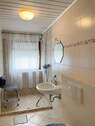 Bad mit ebenerdiger Dusche - 