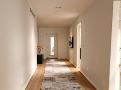 Lichtdurchfluteter Eingangsbereich mit eleganter Raumaufteilung und hochwertigem Eichenholzboden - 