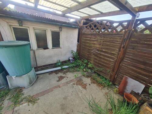 Gartenhaus mit Freisitz - 