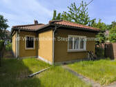 Rückansicht - Berlin-Altglienicke Bungalow - Einfamilienhaus mit schönem großem Garten und viel Nebengelass