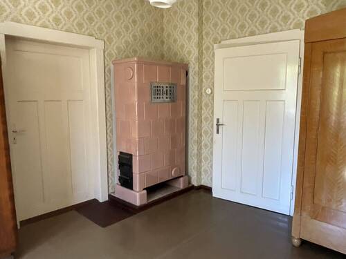 Raum 2 EG mit Ofen - 