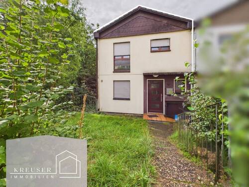 Bild 1 - Einfamilienhaus mit Einliegerwohnung in begehrter Lage!