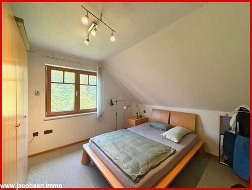 Schlafzimmer im Dachgeschoss - 