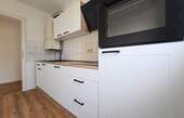 Küche - Nagelneue Küche: 2-Zimmer-Wohnung mit Balkon