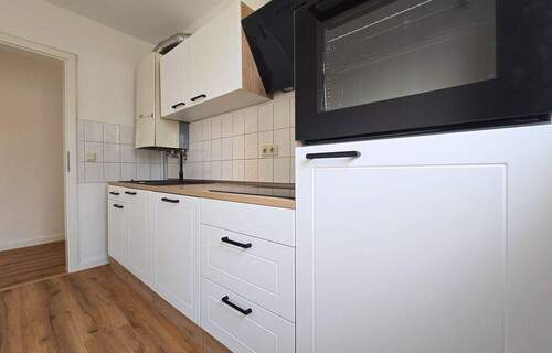Küche - Nagelneue Küche: 2-Zimmer-Wohnung mit Balkon
