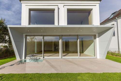 Südseite - Neubau Einfamilienhaus mit möglicher Einliegerwohnung, Tiefgarage und Traumblick