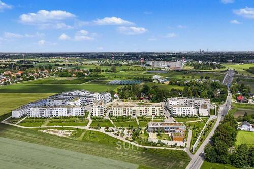 Luftbild Quatier - NEUWERTIGES REH mit hochwertiger VOLLAUSSTATTUNG, Garten, Wintergarten im NATURNAHEN Neubauquartier