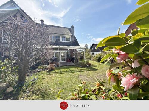 H&T Immobilien - Doppelhaushälfte in Stuhr - Familienparadies: Reihenendhaus mit Terrasse & Garten