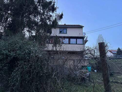 Rückfront - Einfamilienhaus mit 125,00 m&sup2; in Schiffweiler zum Kaufen