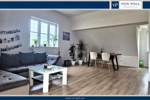 Bild 1 - Gemütliche Wohnung mit großem Wohnzimmer und Balkon