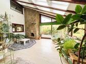 Wintergarten mit Zugang zum Garten - 