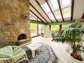 Wintergarten mit offenem Kamin - 