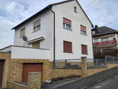 Bild 1 - Mehrfamilienhaus in B.N.-Steinfurth