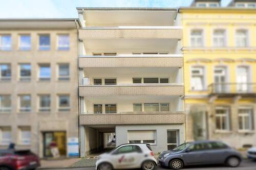 A. Front 2 - Investieren in Sicherheit: Grundsolides 6-Parteienhaus mit 3 Garagen inmitten des Aachener Zentrums!