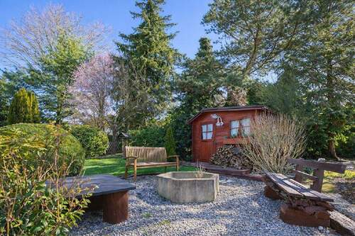 Die Gartenhütte mit zusätzlichem Sitzplatz - 