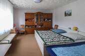 Schlafzimmer - 1 Zimmer Einfamilienhaus in Coswig (Anhalt)