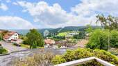 Ausblick - Charmante 2-Zimmer-Terrassenwohnung mit Weitblick, Südbalkon & TG-Stellplatz