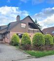 Blick auf das Haus - 7 Zimmer Mehrfamilienhaus, Wohnhaus zum Kaufen in Hatten