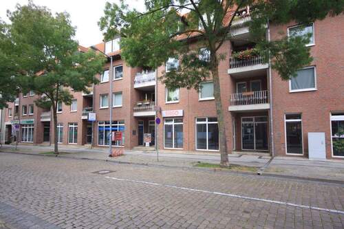 Hausansicht - Schöne 2-Zimmer-Dachgeschosswohnung mit Balkon in direkter Nähe vom Rathaus