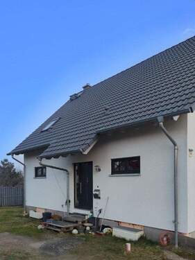 Front - Mehrfamilienhaus, Wohnhaus mit 166,00 m&sup2; in Springe zum Kaufen