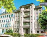 Hausansicht - NEUWERTIGE Wohnung mit Parkett, Fußbodenheizung, Balkon sowie Gartenanteil in Stadtparknähe!!!
