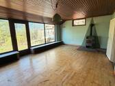 Wohnzimmer mit Kaminofen - Bauernhaus, Landhaus mit 160,00 m&sup2; in Jade zum Kaufen
