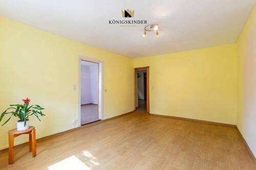 1.OG Wohnzimmer- Wärme und Gemütlichkeit: Das Herzstück des Hauses - 