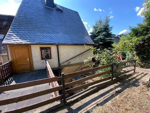 Rückansicht und Terrasse - Reihenendhaus mit 90,00 m² in Zschopau zum Kaufen
