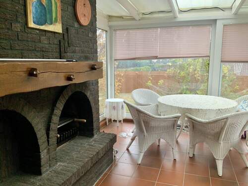 Wintergarten mit Kamin - 