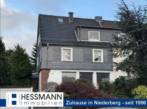 Ansicht - Großzügige Doppelhaushälfte mit 2 Wohnungen auf schönem Grundstück in ruhiger Wohnlage.