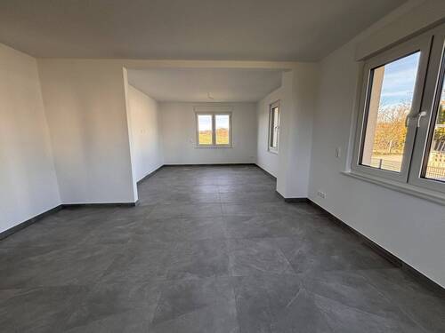 Wohnzimmer / Essbereich - Einfamilienhaus mit 102,90 m&sup2; in Oschersleben zum Kaufen