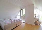 Schlafzimmer im Dachgeschoss - 