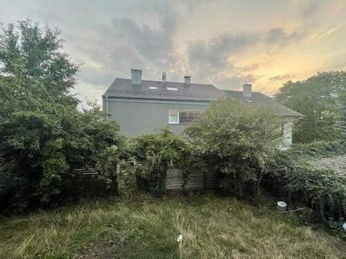 Eigener Gartenanteil mit Sonnenuntergang - 2 Zimmer Terrassenwohnung in Heroldsberg