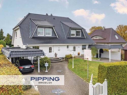 Titelbild - Zeitlose Eleganz trifft Gemütlichkeit: 'Traumhafte Doppelhaushälfte in ruhiger Lage Wentorfs'