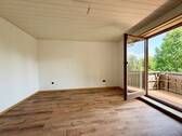 Schlafzimmer mit Ausgang auf den Balkon - 