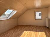Zimmer im Dachgeschoss - 