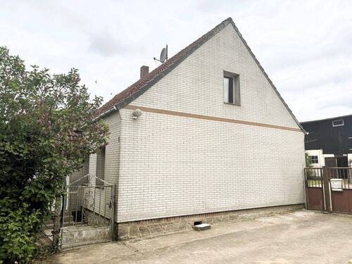 Ansicht Giebelseite - 4 Zimmer Einfamilienhaus in Carpin
