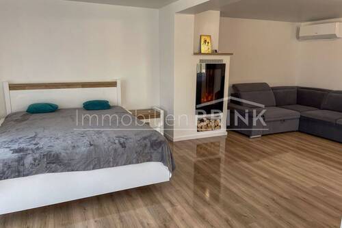 Schlafbereich mit Elektrokamin.jpg - 