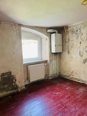 Zimmer 1 im EG - Mehrfamilienhaus, Wohnhaus mit 180,00 m² in Oschatz zum Kaufen
