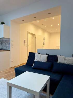 Blick vom Wohnzimmer ins Schlafzimmer/ Flur - 1 Zimmer Etagenwohnung in Fürth