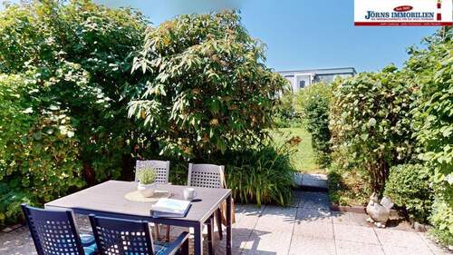 Terrasse in Westlage - Reihenmittelhaus mit 75,00 m&sup2; in Fehmarn zum Kaufen
