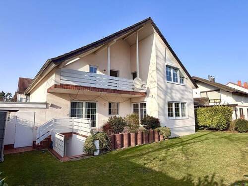 Gartenansicht - 8 Zimmer Mehrfamilienhaus, Wohnhaus zum Kaufen in Heusenstamm