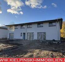 Neubau in Niendorf: Maisonette-ETW im Effizienzhaus 55 mit Terrasse und eigenem Garten - Hamburg