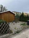 Garage mit Zufahrt Gartenseite - 