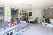 Großes Wohnzimmer - 4 Zimmer Einfamilienhaus zum Kaufen in Berlin