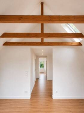 Bild 1 - Wohnen wie im eigenen Haus - Exklusive Maisonettewohnung am Wald mit großer Sonnenterrasse